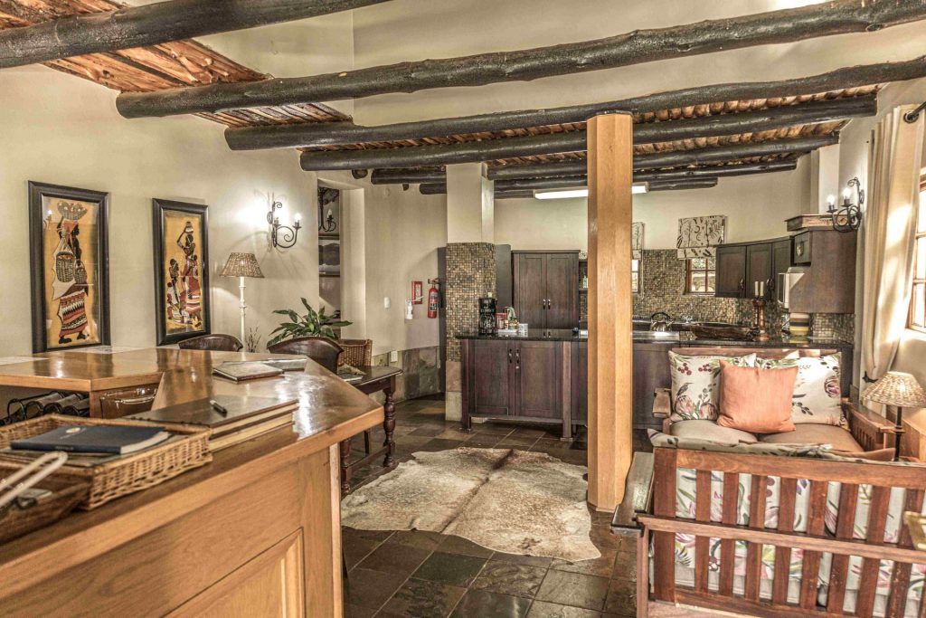 Kitchen-bar-and-relax-area-1-trip-e1701681673411